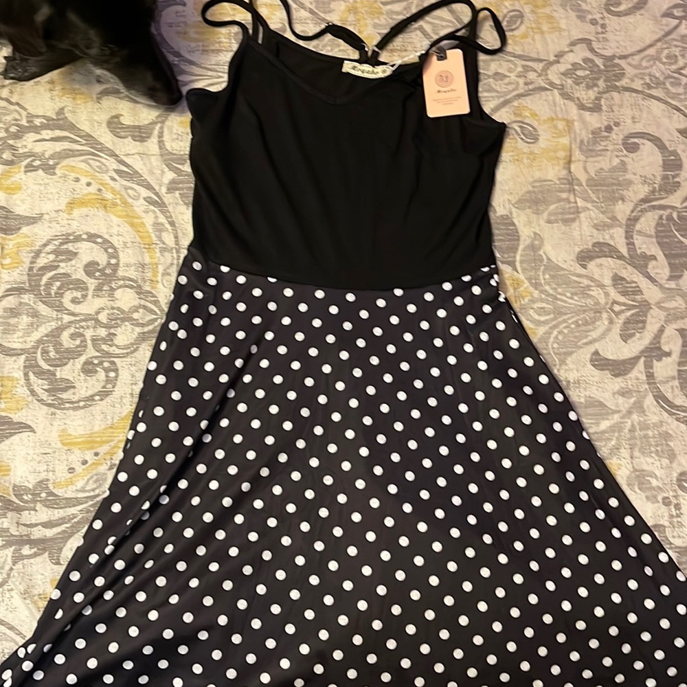 Cute dress. With pockets! Black and polka dot!